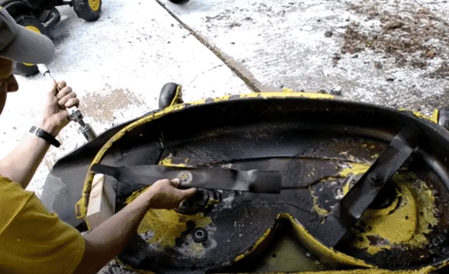 changing mower blades on john deere zero turn