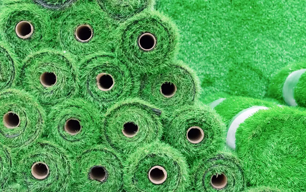 A pile of artificial grass rolls.